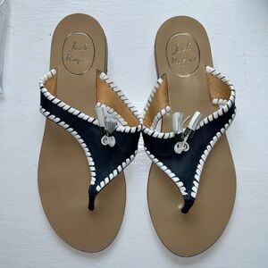 Comfortable Jack Rogers in great condition. Navy and white detail with tassel.